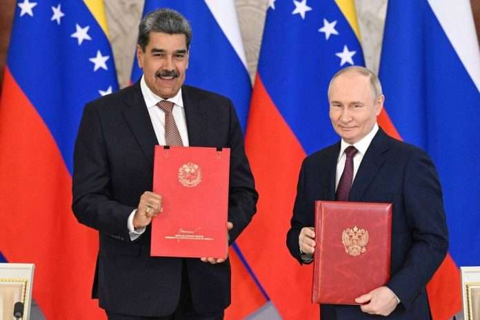 Nicolas-Maduro-y-Vladimir-Putin-696x464